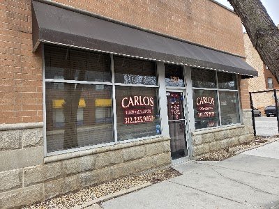 Carlos' Tailor Shop logo