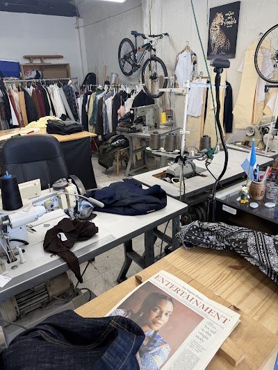 Cesar's Tailor Shop and Alterations logo