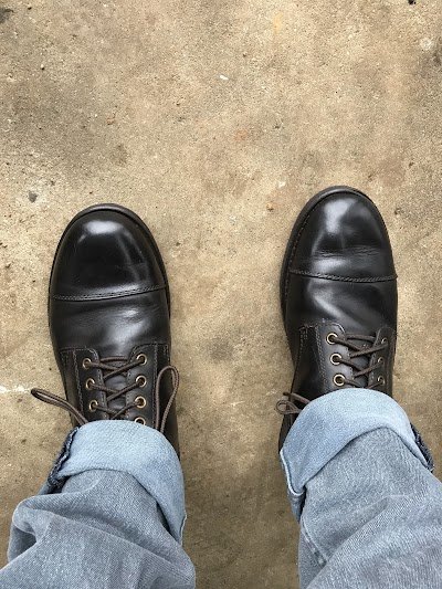 Eugene's Shoe Repair logo