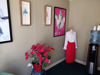 Gino's Tailor Shop logo
