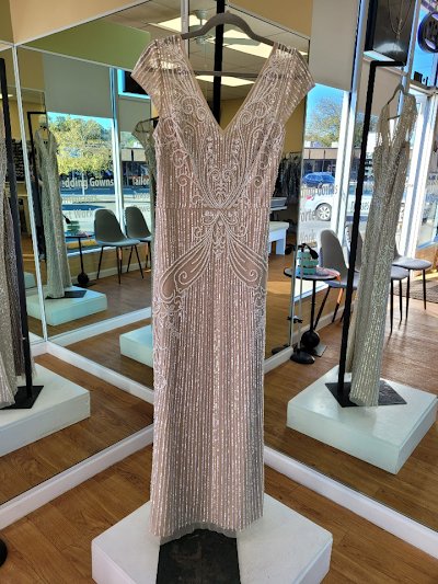 Kim's Alterations logo