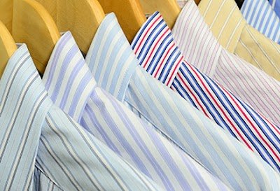 Mega Dry Cleaners logo