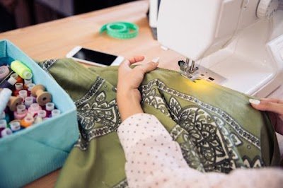Nina Alterations & Custom Sewing logo