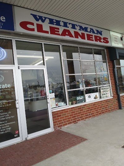 Whitman Cleaners logo