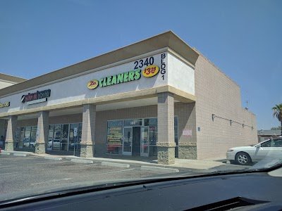 Zest Dry Cleaners logo